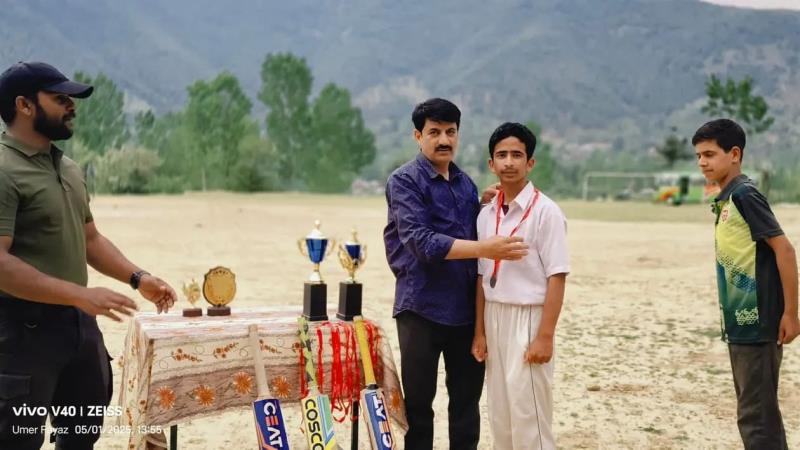The final match of the Inter School Cricket Tournament was played between Tajamul 11 and Haroon 11. Haroon 11 won the toss and chose to bat first, setting a target of 61 runs for the loss of 6 wickets in 10 overs. In response, Tajamul 11 chased down the target in just 7.1 overs, losing 6 wickets in the process, and secured victory by 4 wickets. The entire tournament was conducted under the supervision of the Physical Education Teacher, Mr. Bilal Ahmad Malik, who ensured its smooth organization and sportsman spirit. The final match was graced by esteemed guests, including the Town Commander of Trehgam, the respected Officer In Charge (OIC) of Hajipir Army Goodwill School (HAGS) Trehgam, the Principal of HAGS, and all the dedicated staff members. Their presence added great value and motivation for the young participants, making the event a memorable success.